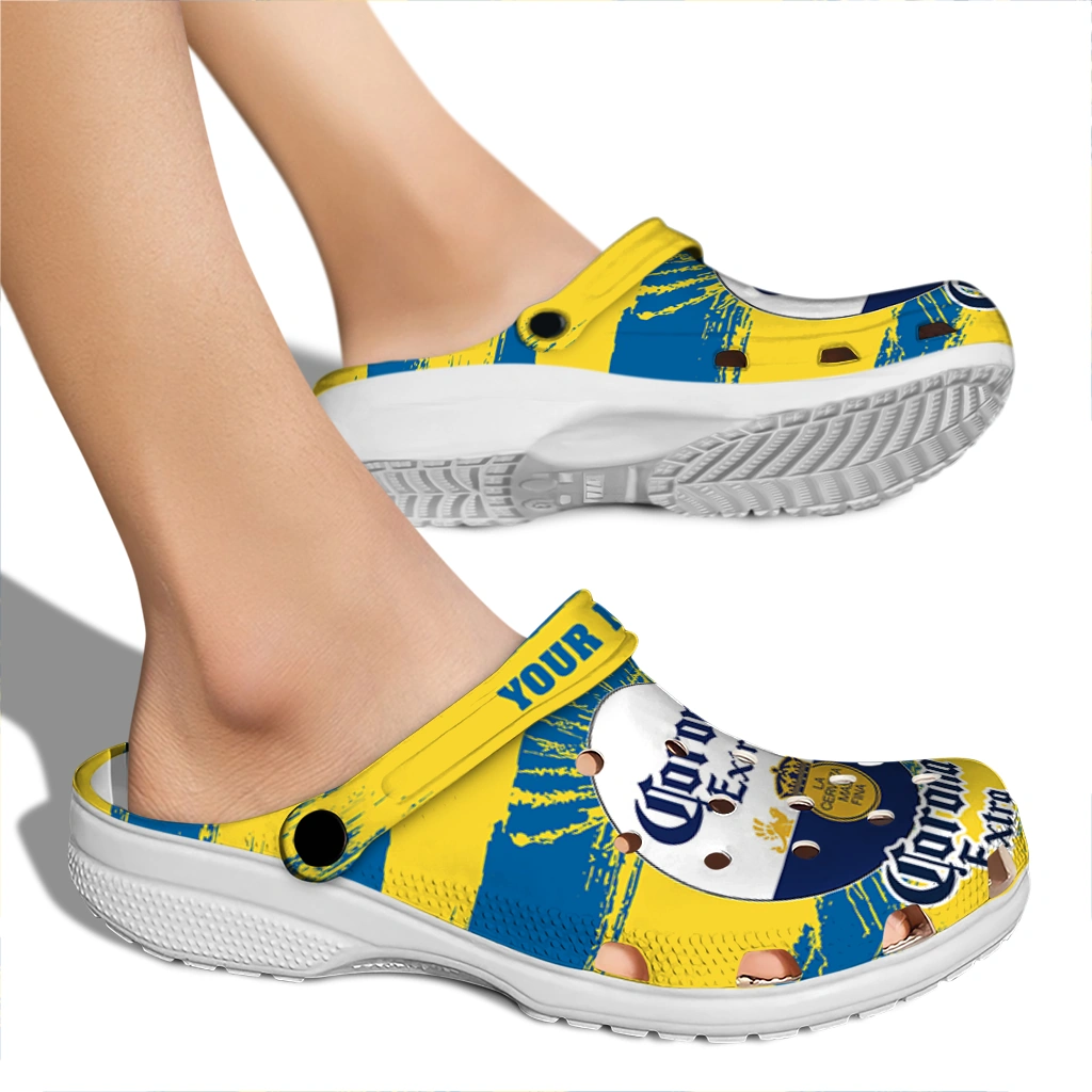 custom-corona-beer-insignia-blue-yellow-clogs-fashion-forward-hey-clogs.webp
