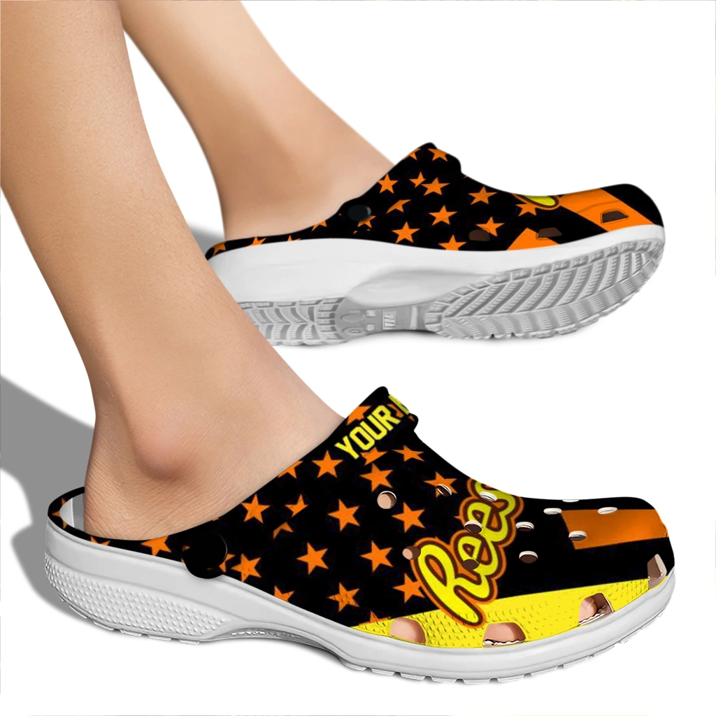 custom-reeses-orange-star-black-orange-clogs-fashion-forward-hey-clogs.webp