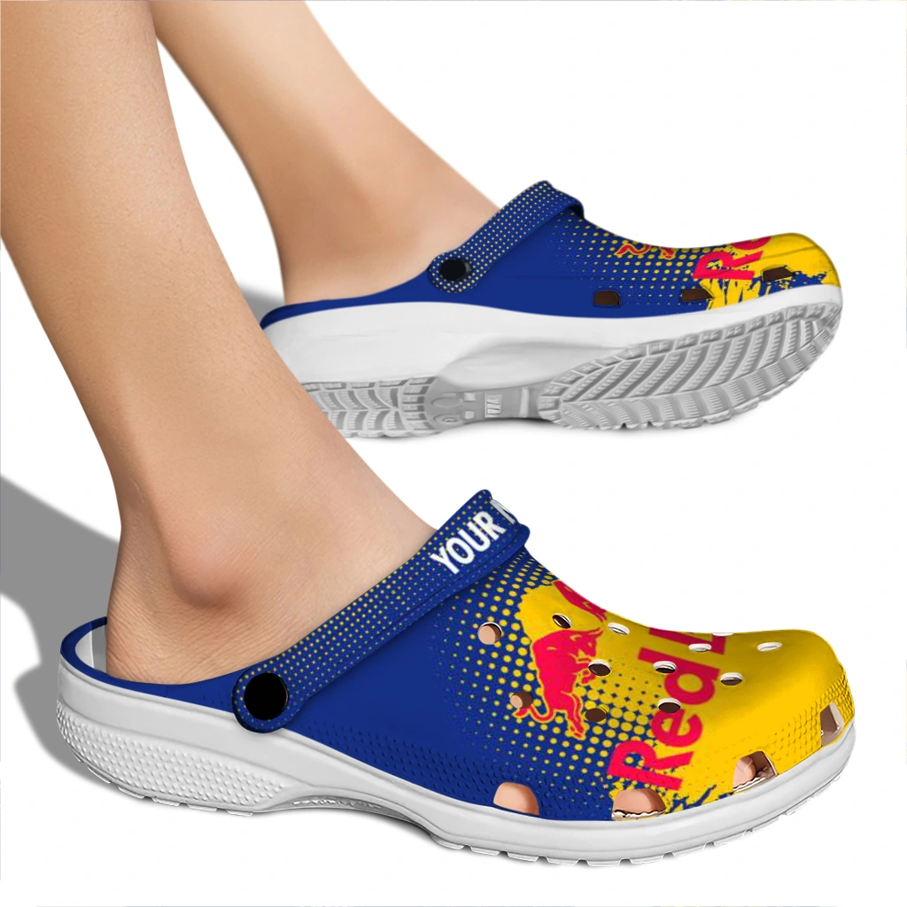 customized-red-bull-emblem-blue-yellow-clogs-fashion-forward-hey-clogs.webp