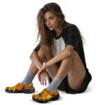 customized-reeses-mascot-orange-yellow-clogs-best-selling-hey-clogs.webp
