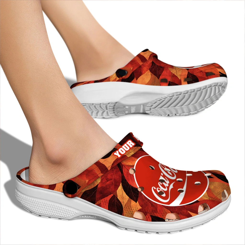 personalized-coca-cola-autumn-leaves-red-orange-clogs-fashion-forward-hey-clogs.webp