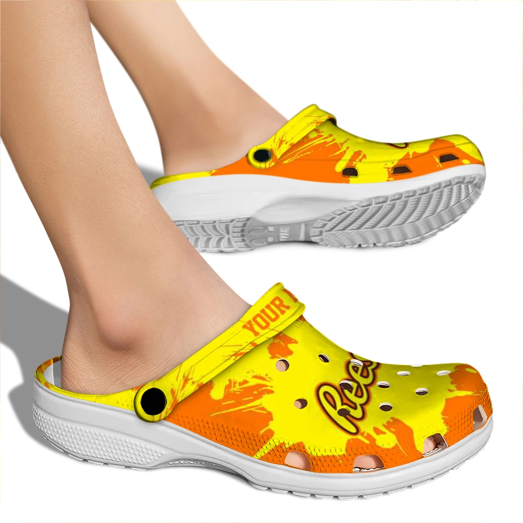 personalized-reeses-burst-orange-yellow-clogs-fashion-forward-hey-clogs.webp