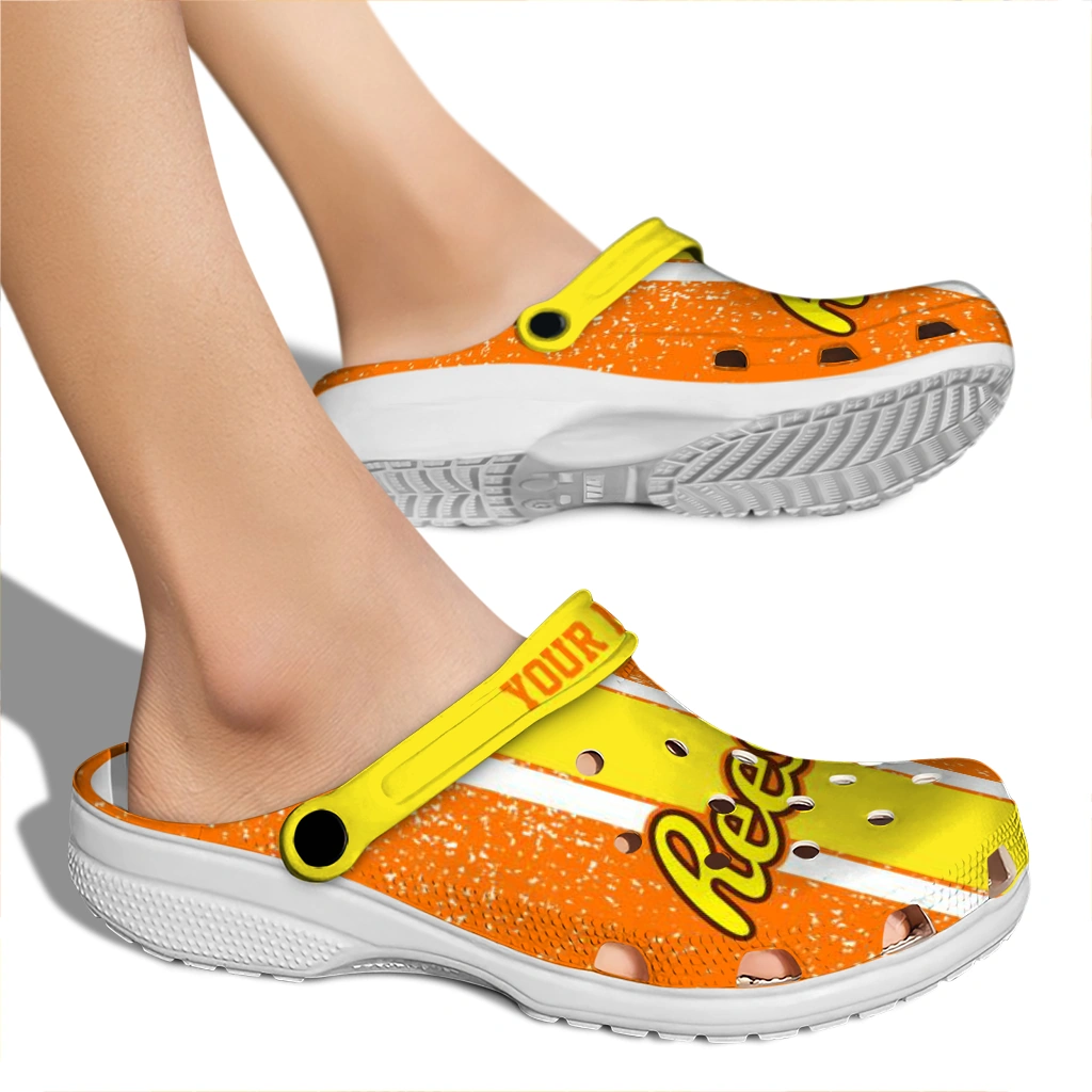 personalized-reeses-letters-orange-yellow-clogs-fashion-forward-hey-clogs.webp