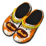 personalized-reeses-orange-splat-orange-yellow-clogs-best-selling-hey-clogs.webp